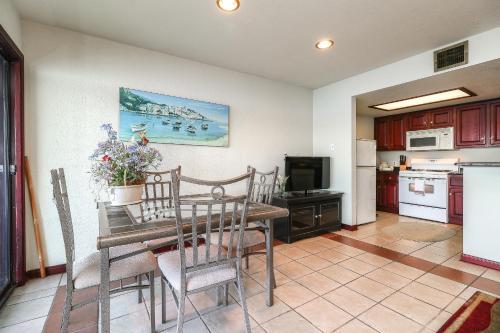 a kitchen and dining room with a table and a television at Resort Attractions in Willis