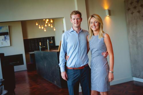 a man and a woman posing for a picture at The Old Schoolhouse Inn in Comber