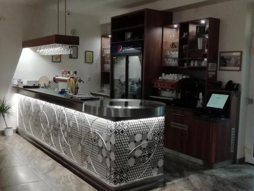 a kitchen with a counter with a counter top at Motorest U Kola in Prostějov