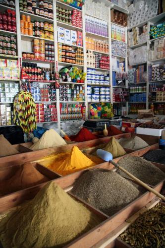 a store filled with lots of different types of spices at Riad Tchaikana in Marrakech
