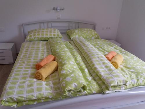 Postel nebo postele na pokoji v ubytování Apartma Momo