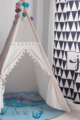 a cake with a white tent on top of a table at 1949 Dreamy Home in Panglao