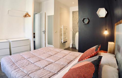 Katil atau katil-katil dalam bilik di Appartements entre Provence et Camargue