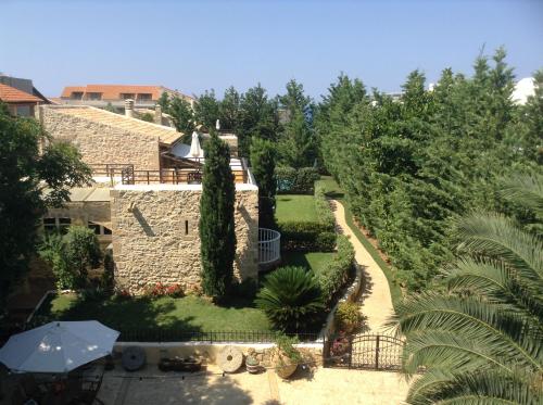 an aerial view of the garden of a house at Rock House's Villa Melody in Plataniás