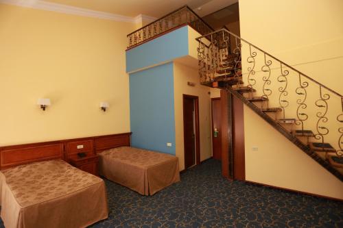 Hotel Russiaにあるベッド