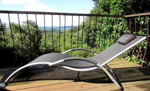 Ein Balkon oder eine Terrasse in der Unterkunft Evergreen Cabin Karkloof