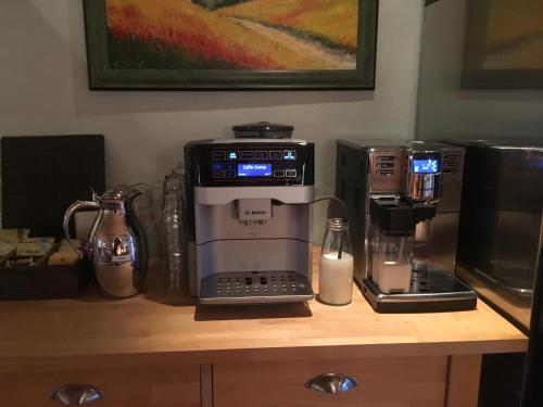 a coffee machine sitting on top of a counter at Best Bed in Herning