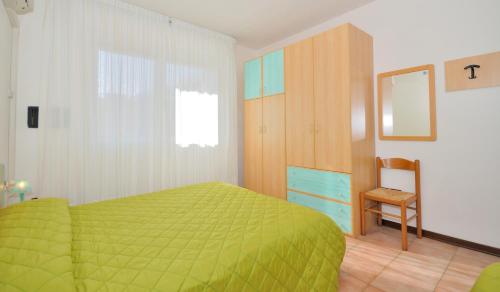 Postel nebo postele na pokoji v ubytování Villaggio Lido del Sole