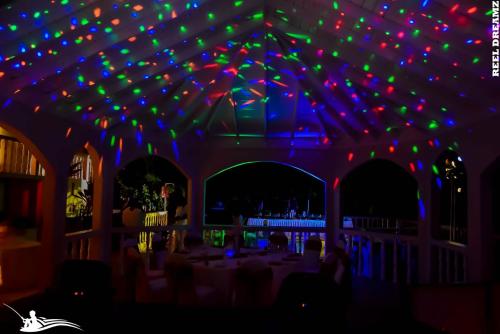 a room with a bunch of lights on the ceiling at Retreat Guest House in Falmouth