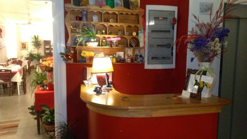 a counter in a store with a lamp on it at Hotel La Congiura dei Baroni in Teggiano