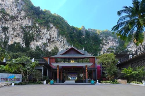 a building in front of a mountain at The Scene Cliff View Villas in Ao Nang Beach