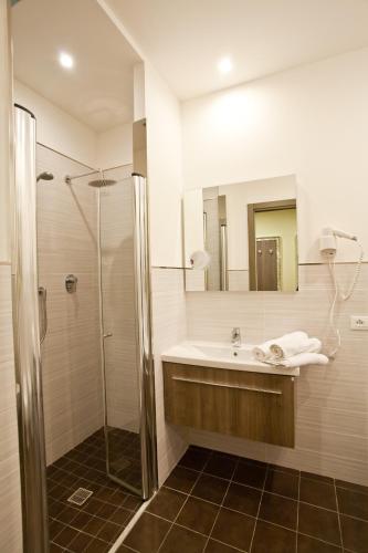 a bathroom with a sink and a shower at Residence Elisabetta in Cesenatico