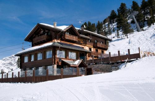 Chalet Dei Rododendri durante o inverno