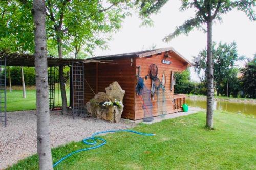 a smallshed with a painting on the side of it at B&B Mo Va Là in Budrio