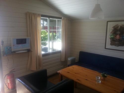 Televisyen dan/atau pusat hiburan di Åros Feriesenter