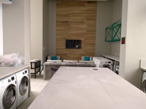 Легло или легла в стая в Flat Aconchego, próximo ao centro de Osasco, ar condicionado, academia, piscina, wifi e varanda