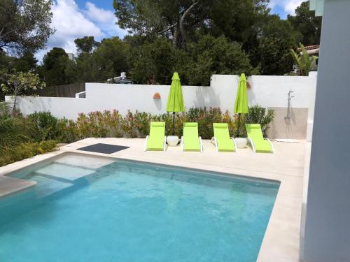 Πισίνα στο ή κοντά στο Es Queixal - Can Canet con piscina exterior climatizada