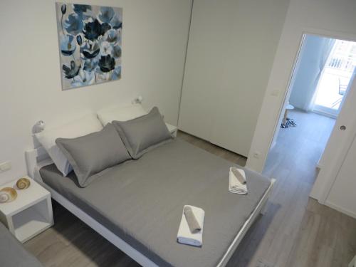 Postel nebo postele na pokoji v ubytování Apartmani Raos
