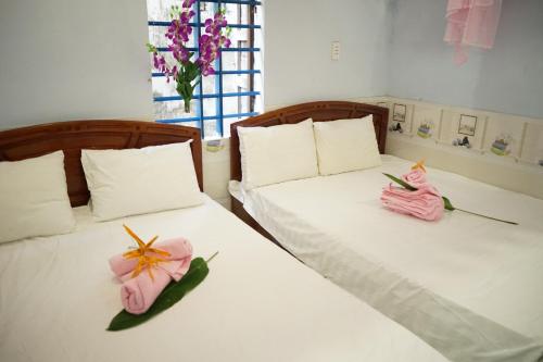 Postel nebo postele na pokoji v ubytování Bai Huong homestay