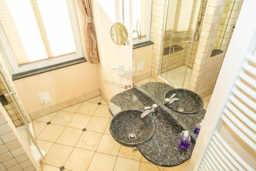 Bilik mandi di Apartments Wald-Residenz Bansin