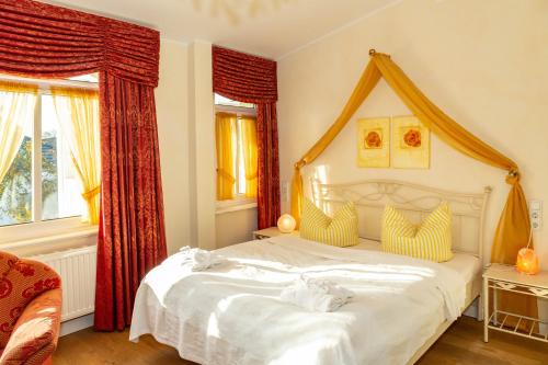 Postel nebo postele na pokoji v ubytování Apartments Wald-Residenz Bansin