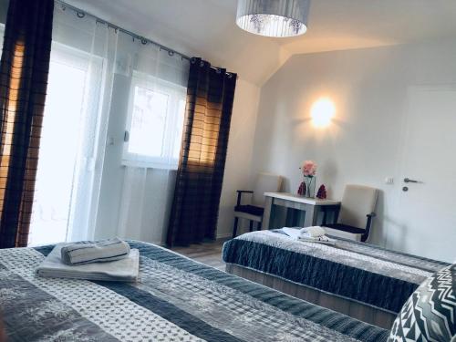 Postel nebo postele na pokoji v ubytování Apartment Panorama Mostar