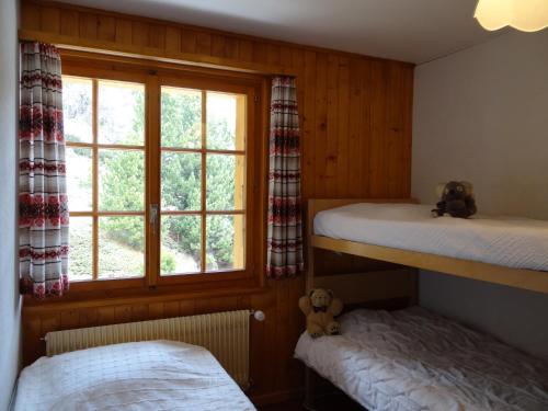 Postel nebo postele na pokoji v ubytování Marmottes F43