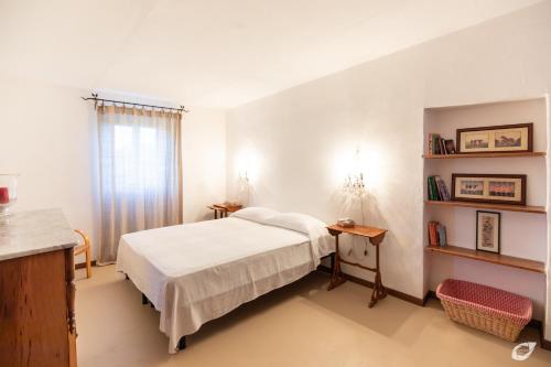 Postel nebo postele na pokoji v ubytování Casa di Charme, Rio nell'Elba