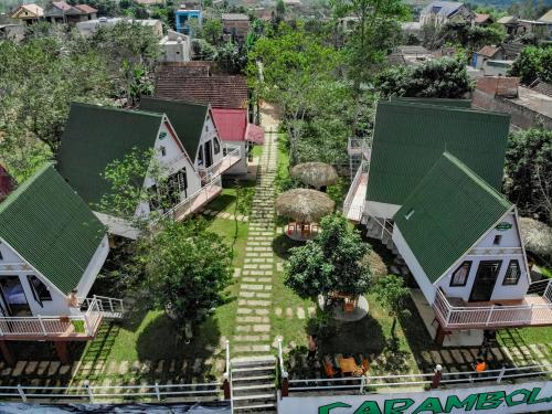 an overhead view of a house with a green roof at Carambola Bungalow in Phong Nha