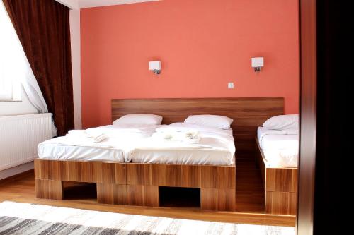Postel nebo postele na pokoji v ubytování Hotel Casablanca
