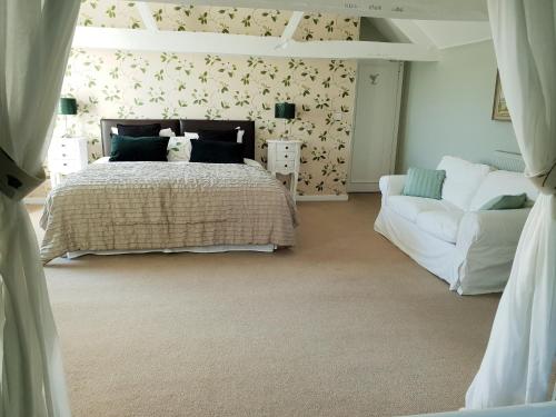 Ein Bett oder Betten in einem Zimmer der Unterkunft Orles Barn Guest House