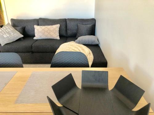 Coin salon dans l'établissement Scandinavian Sweet home 18 Heart of City