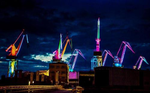 a group of colorful lights in a city at night at Oliva Holiday Apartment in Banjole