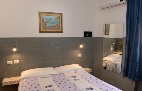 Una cama o camas en una habitación de Hotel Puntabella