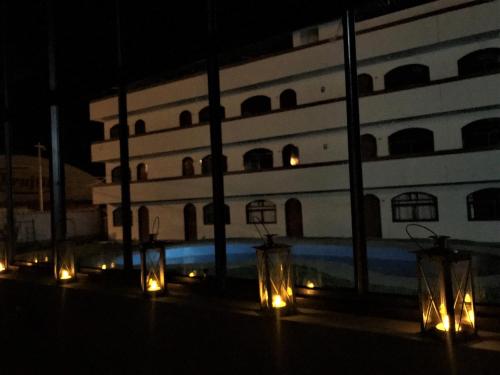 a view of a building at night with lights at Los Alamos in Caraz