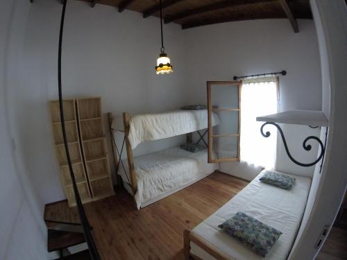Ένα ή περισσότερα κρεβάτια σε δωμάτιο στο Casitas Sancle