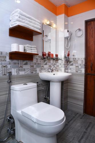 Un baño de Karma Boutique Hotel