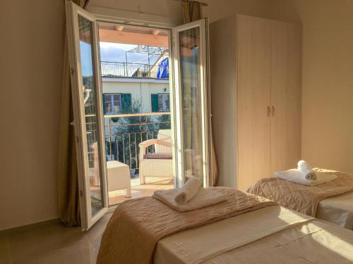 Ένα ή περισσότερα κρεβάτια σε δωμάτιο στο The Central Suites