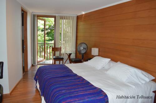 Ένα ή περισσότερα κρεβάτια σε δωμάτιο στο Cocurantu Hotel Boutique