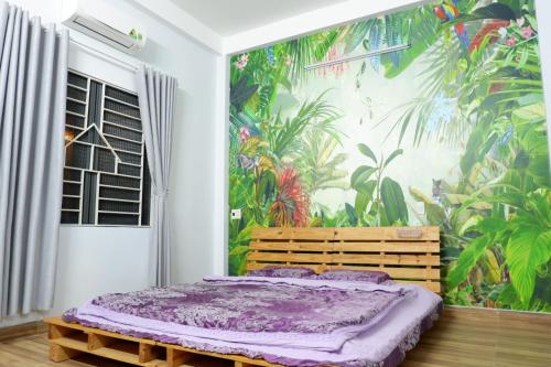 Giường trong phòng chung tại Danang Retreat House