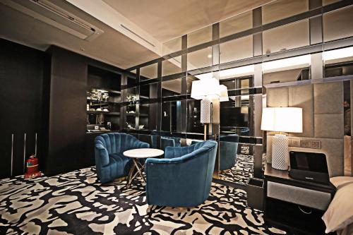 Гостиная зона в Best Louis Hamilton Hotel Gwangan