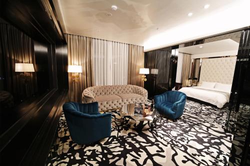 Кровать или кровати в номере Best Louis Hamilton Hotel Gwangan