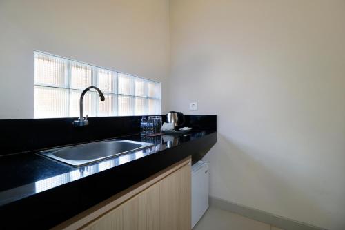 Kuchyň nebo kuchyňský kout v ubytování Vansari Hotel