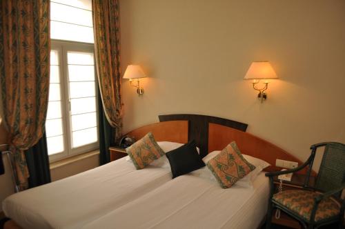 Een bed of bedden in een kamer bij Hotel Moby Dick by WP hotels