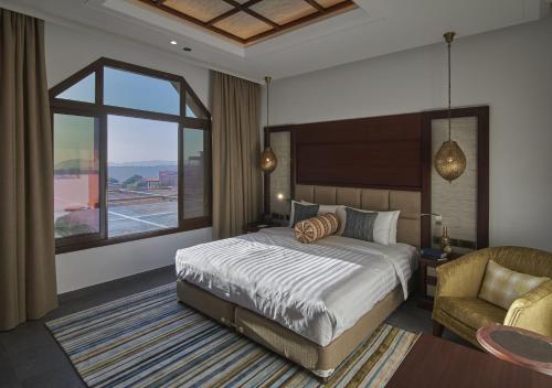 Tempat tidur dalam kamar di Sahab Resort and Spa, Jabal Al Akhdar