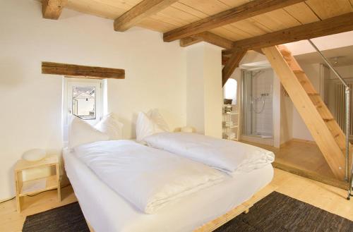 Ein Bett oder Betten in einem Zimmer der Unterkunft Auberge du Mouton