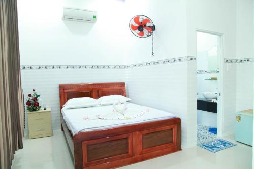 Ένα ή περισσότερα κρεβάτια σε δωμάτιο στο Son Tra Guesthouse