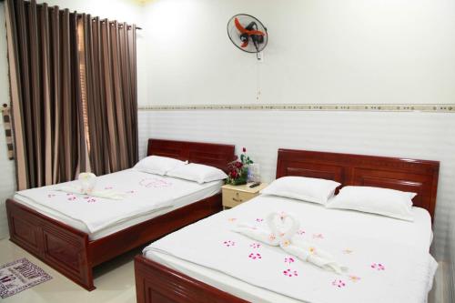 Ένα ή περισσότερα κρεβάτια σε δωμάτιο στο Son Tra Guesthouse