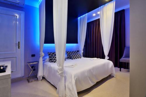 Кровать или кровати в номере Villa La Fenice