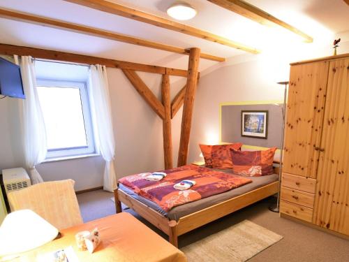 Cozy Apartment in Grundshagen with Gardenにあるベッド